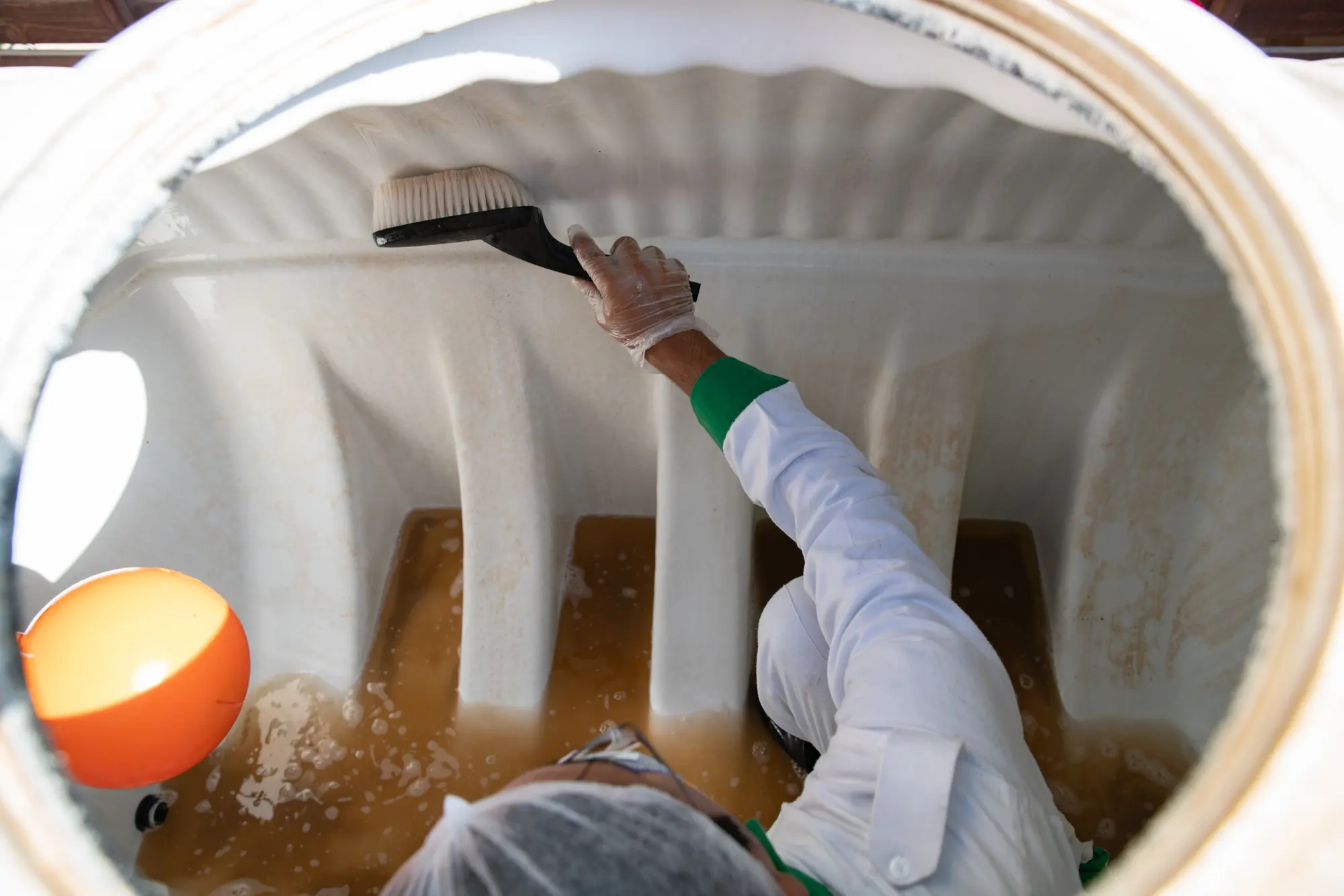 Technician inside a water tank