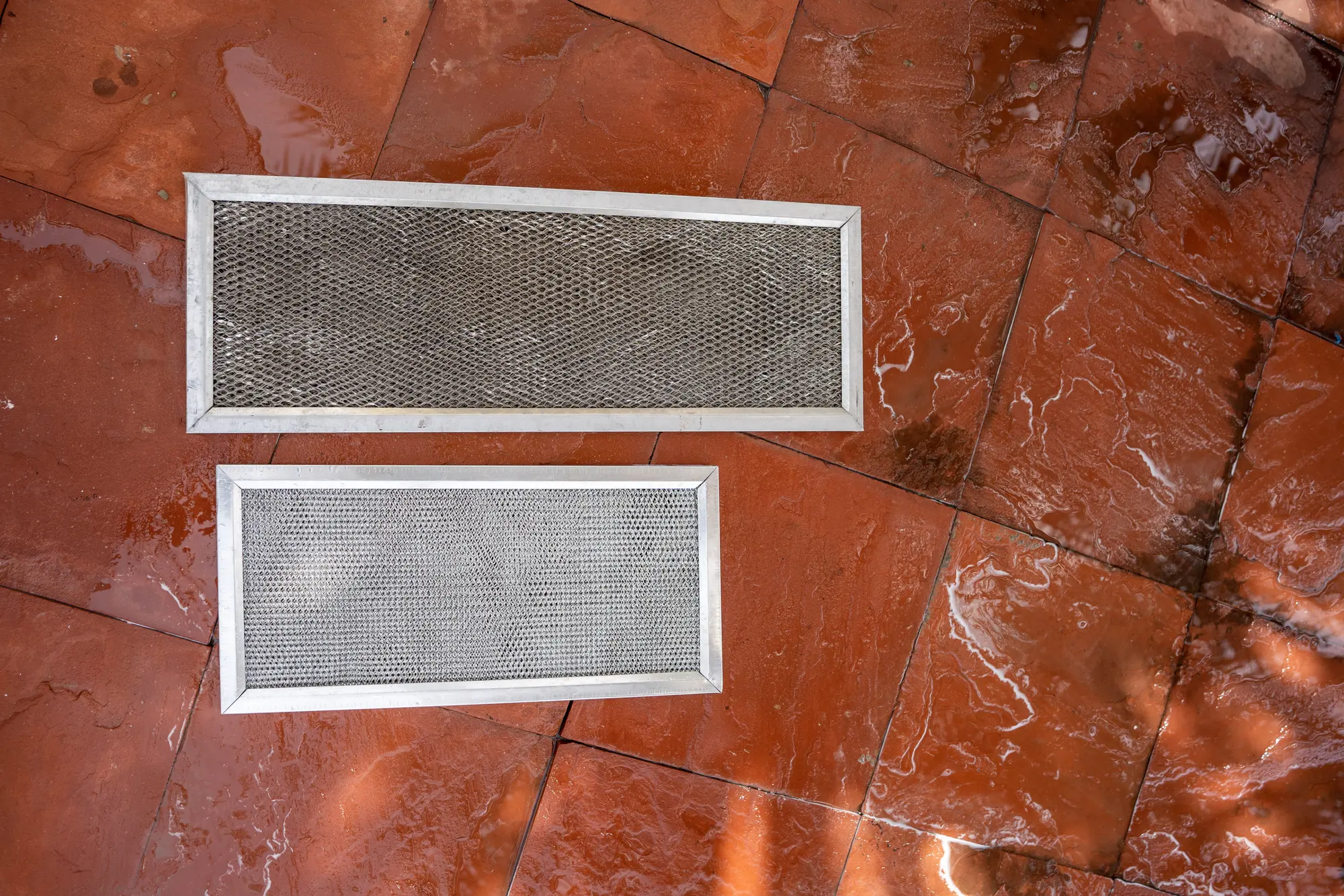 Clean and dirty AC filters side by side
