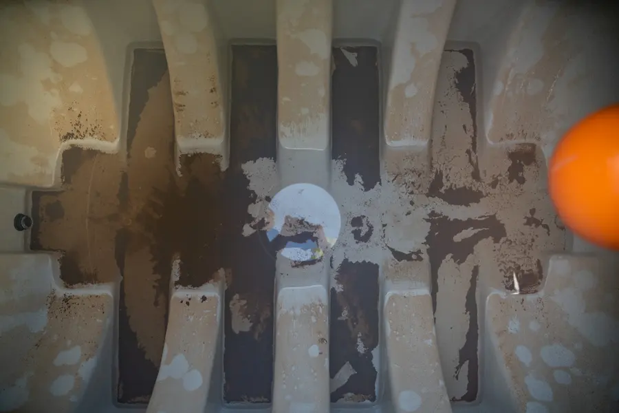 Sediment on the floor of a water tank